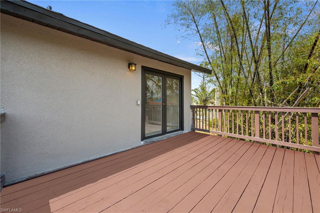 17397 Lee Road Fort Myers, FL 33967 - Photo 16 of 22 a view of a wooden deck