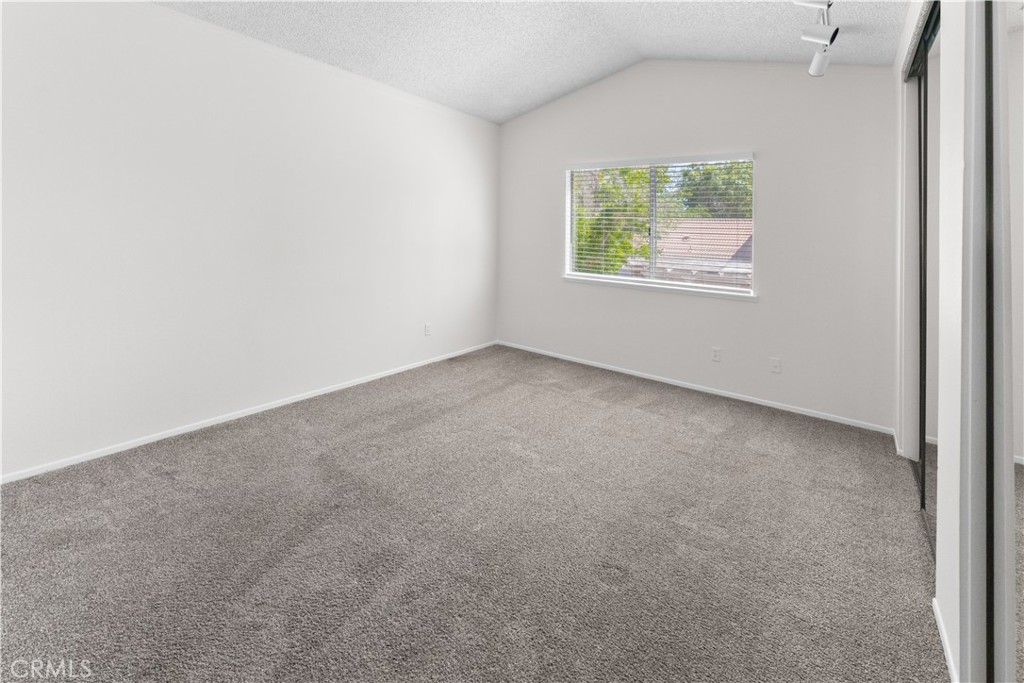 1232 Kings Road Palmdale, CA 93551 - Photo 12 of 32 an empty room with windows