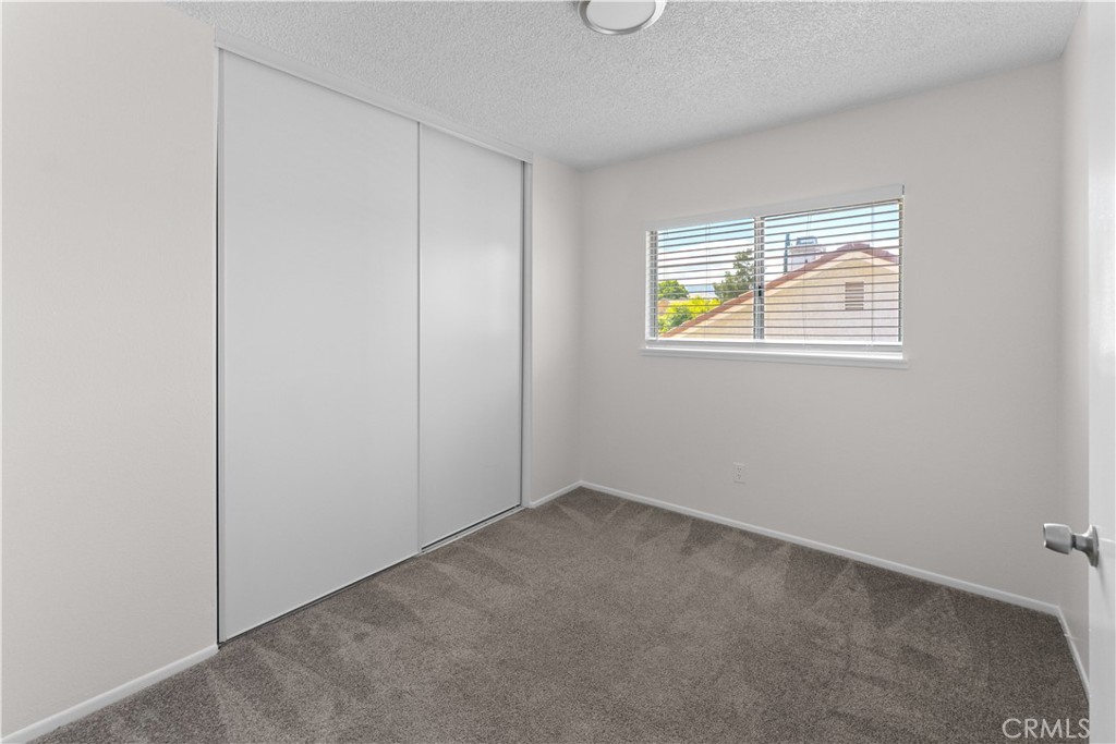 1232 Kings Road Palmdale, CA 93551 - Photo 4 of 32 an empty room with windows