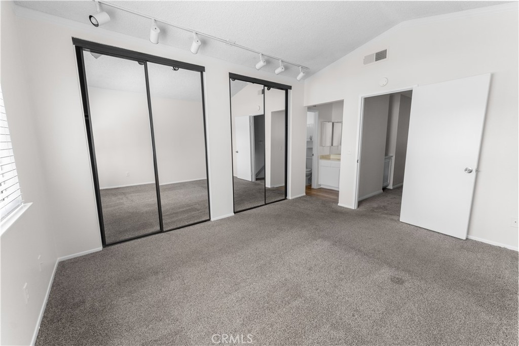 1232 Kings Road Palmdale, CA 93551 - Photo 9 of 32 a view of empty room with windows