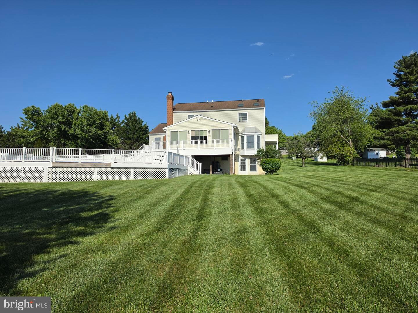 9534 Liberty Road Frederick, MD 21701 - Photo 2 of 11 a view of a house with a big yard
