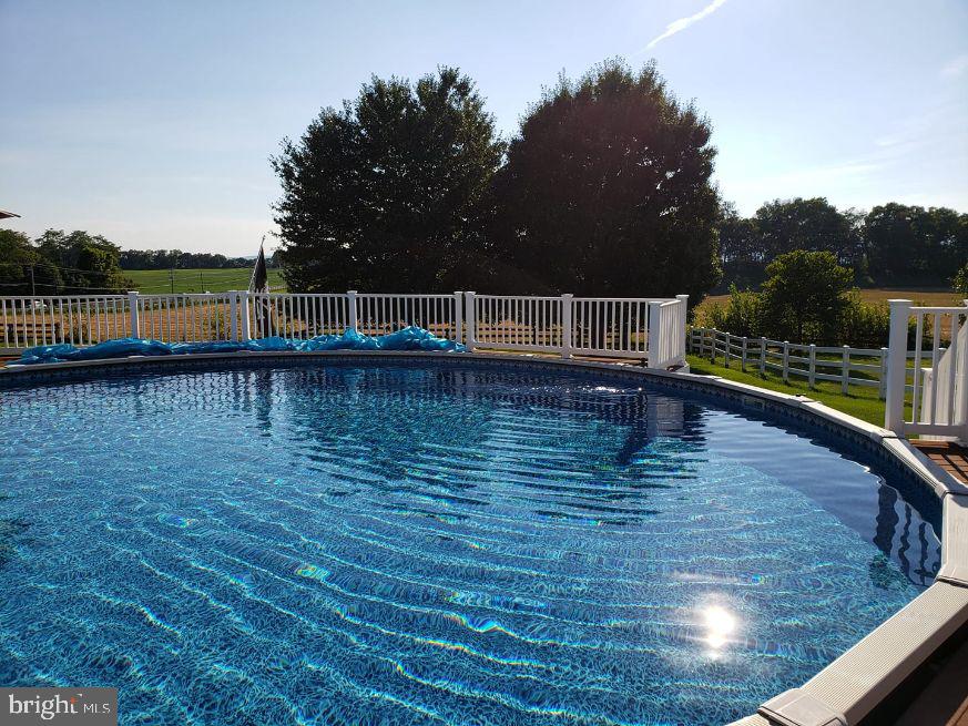9534 Liberty Road Frederick, MD 21701 - Photo 7 of 11 a view of a lake with houses