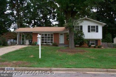 6309 Charnwood Street Springfield, VA 22152 - Photo 1 of 4 a view of a house with a yard