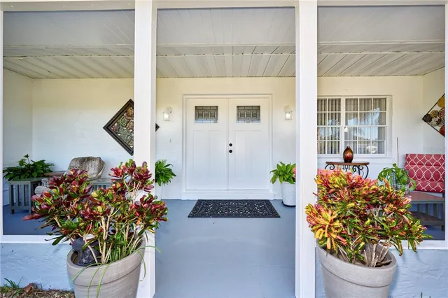 a front view of a house having a yard