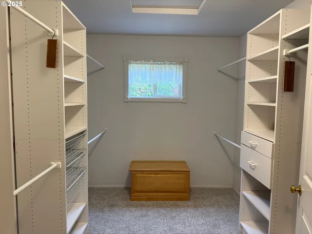 a view of an empty walk in closet
