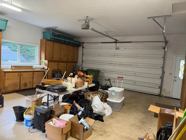 a work room with furniture and a window