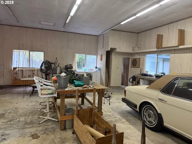 a view of a kitchen and dining area