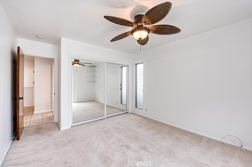 2712 Shell Street Corona del Mar, CA 92625 - Photo 11 of 18 an empty room with a ceiling fan and shower