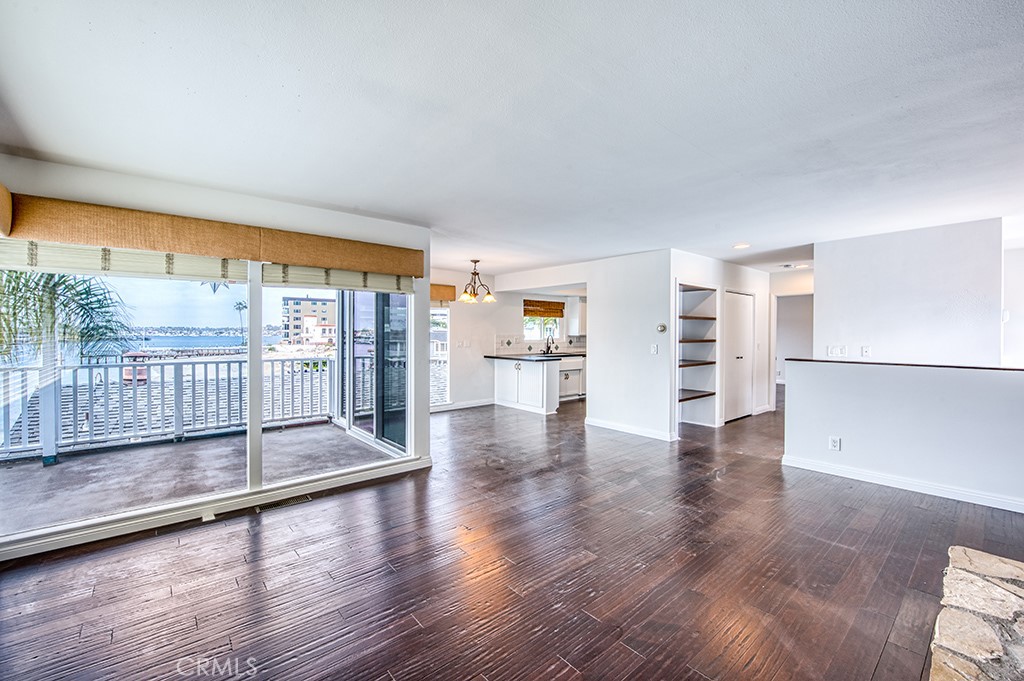 2712 Shell Street Corona del Mar, CA 92625 - Photo 2 of 18 a view of a big room with wooden floor and windows
