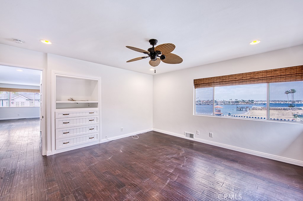 2712 Shell Street Corona del Mar, CA 92625 - Photo 8 of 18 wooden floor in an empty room with a window