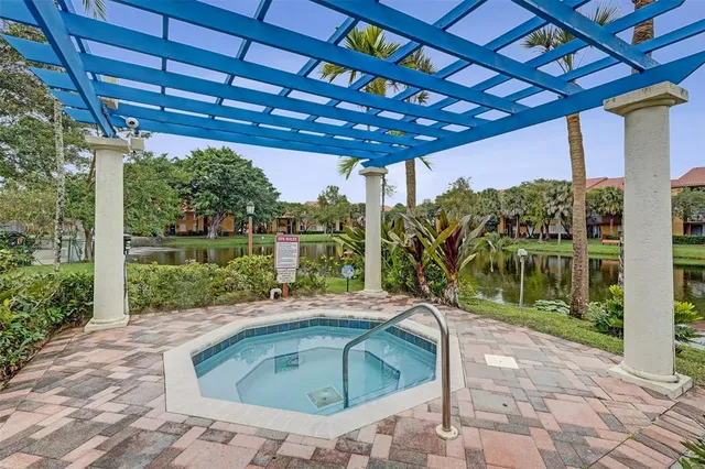a house view with a sitting space and garden