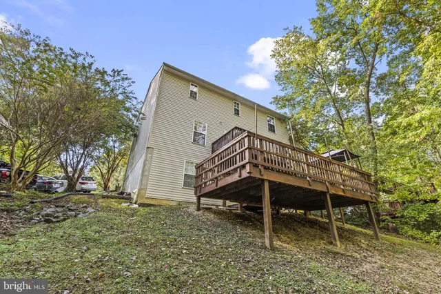 a house view with a backyard space