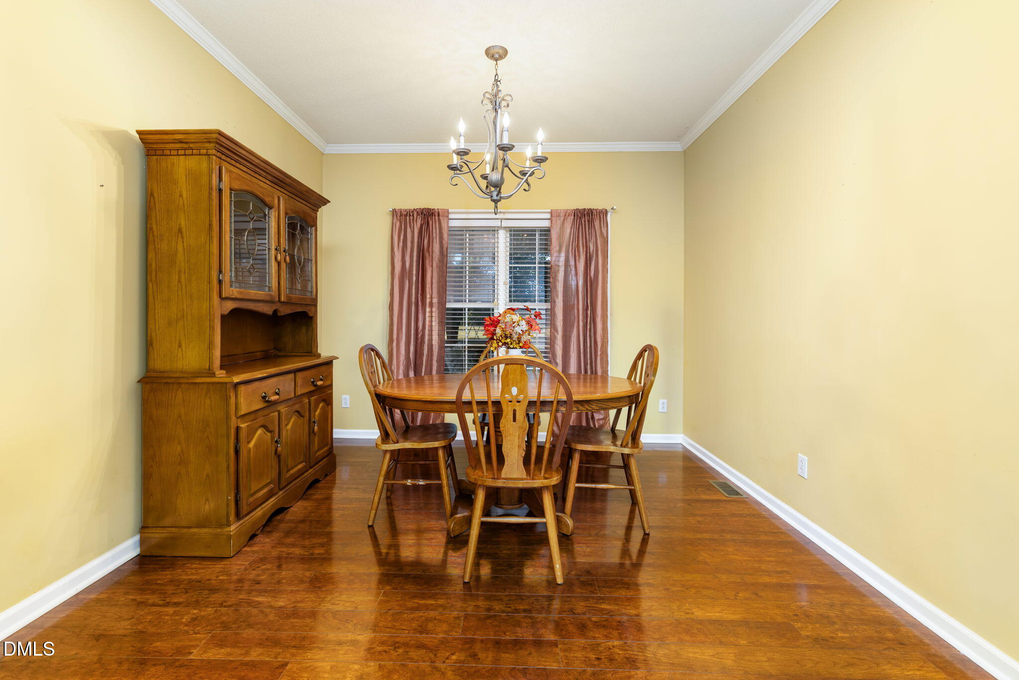 3900 Dabney Road Henderson, NC 27537 - Photo 11 of 35 a view of a dining room with furniture and chandelier