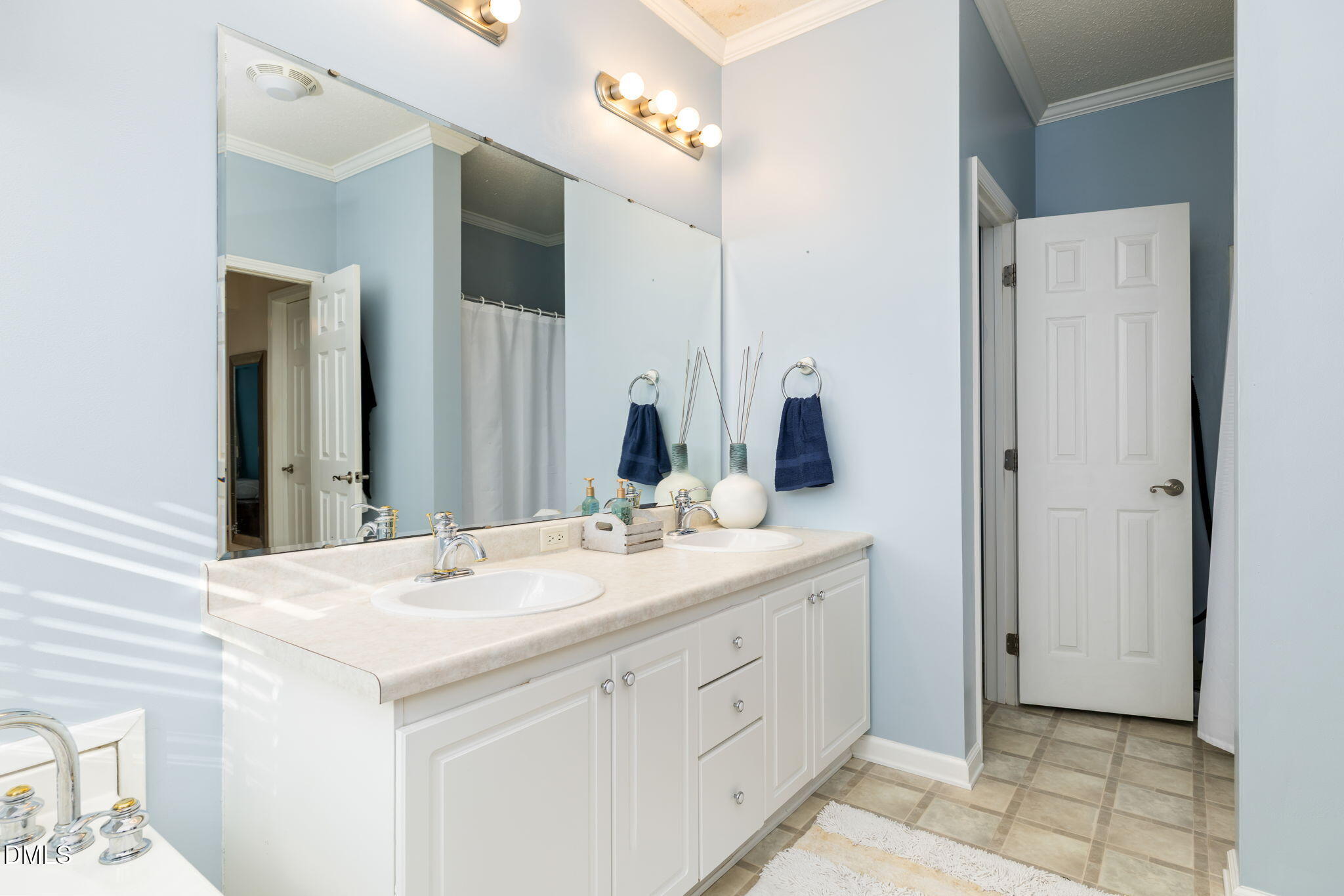 3900 Dabney Road Henderson, NC 27537 - Photo 14 of 35 a bathroom with a sink and a mirror