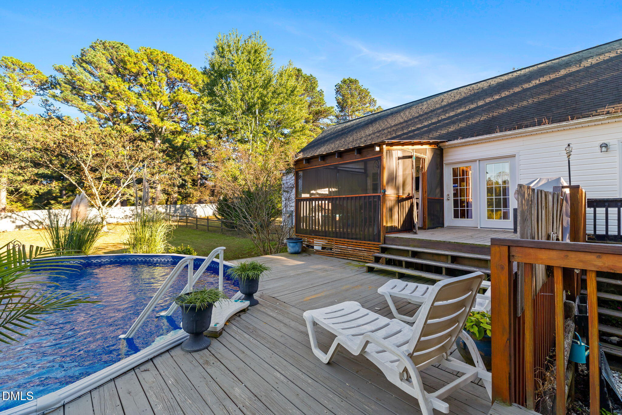 3900 Dabney Road Henderson, NC 27537 - Photo 29 of 35 a view of a chairs on the deck