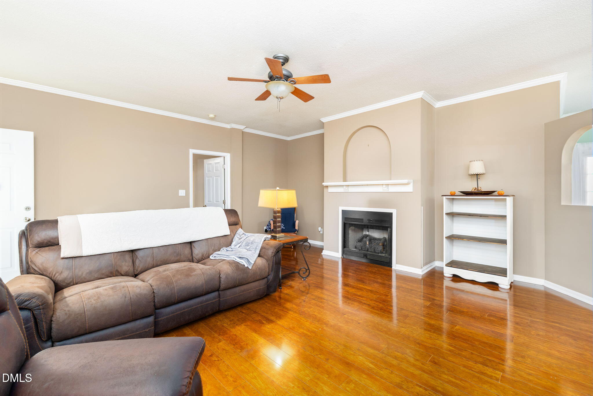 3900 Dabney Road Henderson, NC 27537 - Photo 9 of 35 a living room with furniture and a fireplace