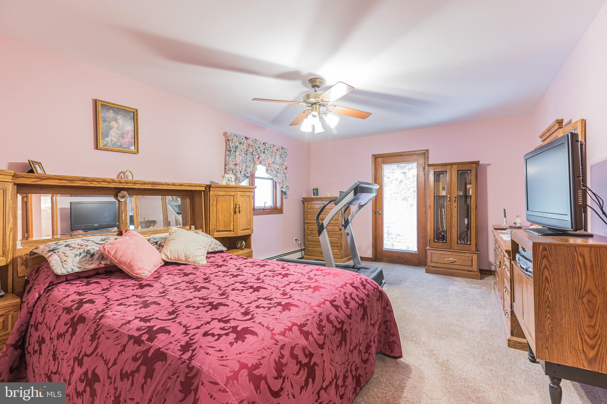 114 Curley Mill Road Chalfont, PA 18914 - Photo 17 of 36 Master Bedroom with outside entrance to back deck