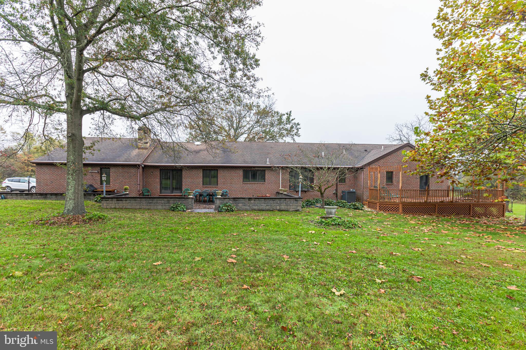 114 Curley Mill Road Chalfont, PA 18914 - Photo 29 of 36 Solid Brick rear with Deck & Patio