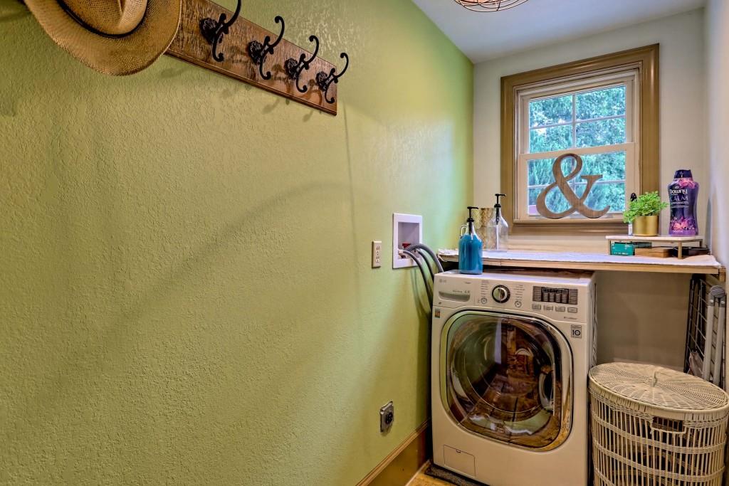 1422 Wolffork Road Rabun Gap, GA 30568 - Photo 28 of 78 a utility room with dryer and washer