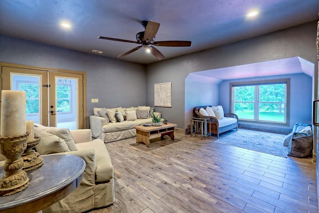 1422 Wolffork Road Rabun Gap, GA 30568 - Photo 39 of 78 a living room with furniture and a large window