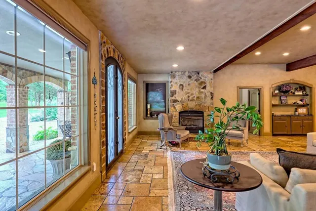 a view of a dining room with furniture window and outside view