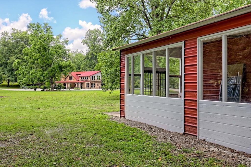 1422 Wolffork Road Rabun Gap, GA 30568 - Photo 56 of 78 a view of a house with backyard and a sitting area