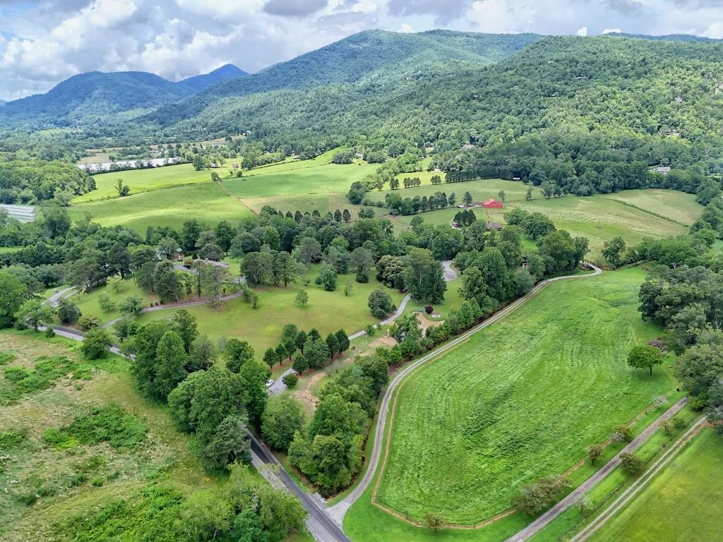 1422 Wolffork Road Rabun Gap, GA 30568 - Photo 77 of 78 a view of a lush green hillside and houses