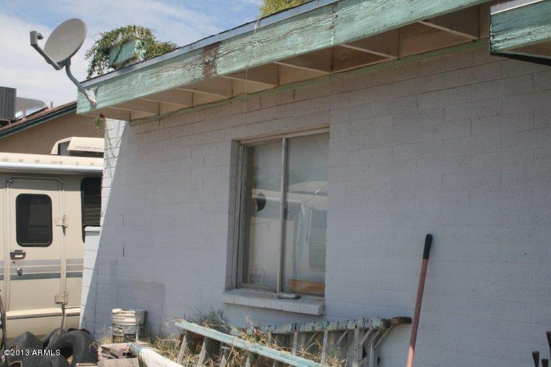 4001 West Thunderbird Road Phoenix, AZ 85053 - Photo 23 of 25 damagewindow2
