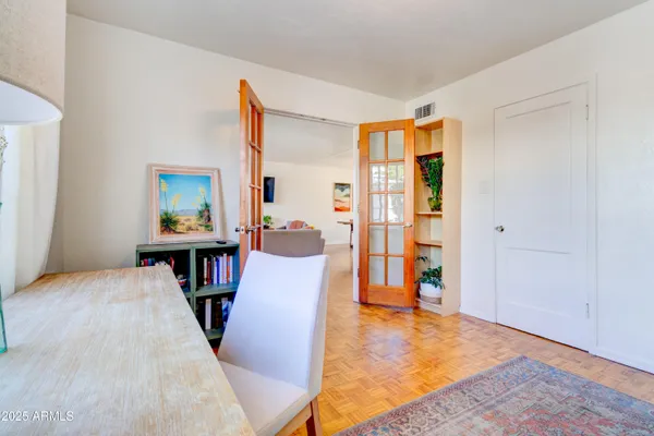 a view of a livingroom with furniture and wooden floor