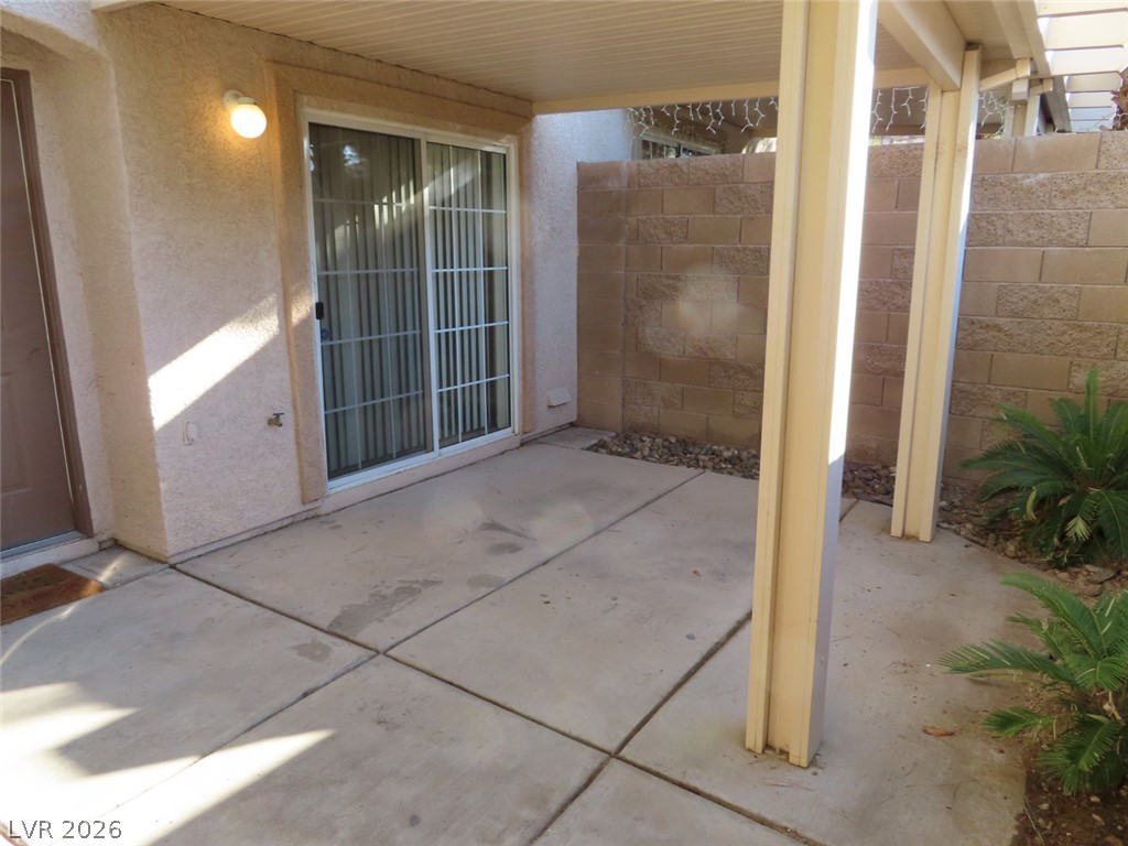 1623 Cave Spring Drive Henderson, NV 89014 - Photo 16 of 16 A private concrete patio offers sheltered outdoor living space with direct home access.