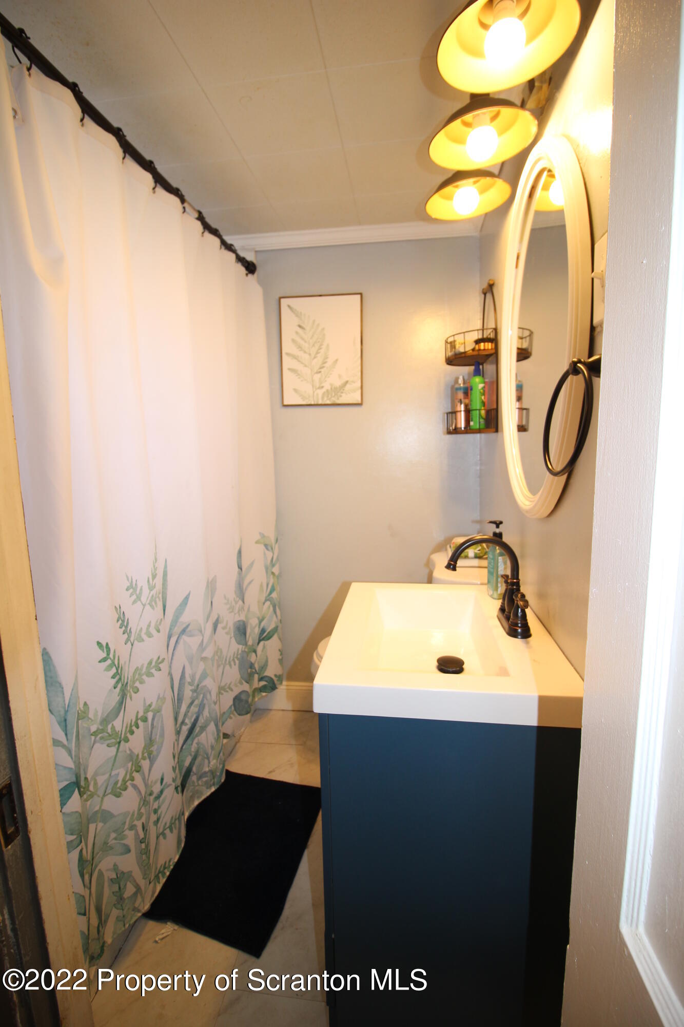 4001 Quicktown Road Moscow, PA 18444 - Photo 12 of 24 a bathroom with a sink and a mirror