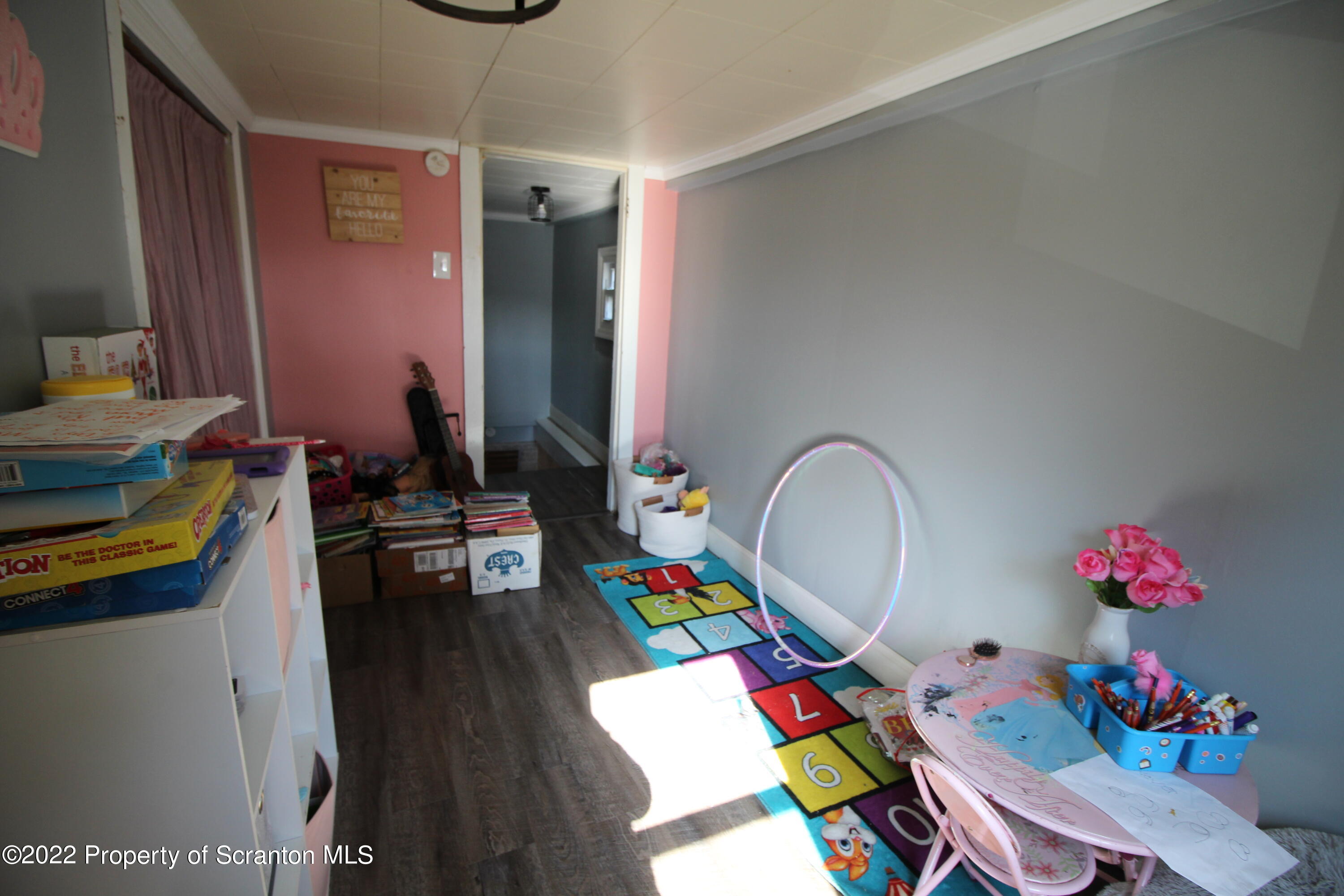 4001 Quicktown Road Moscow, PA 18444 - Photo 16 of 24 a living room with furniture and a wooden floor