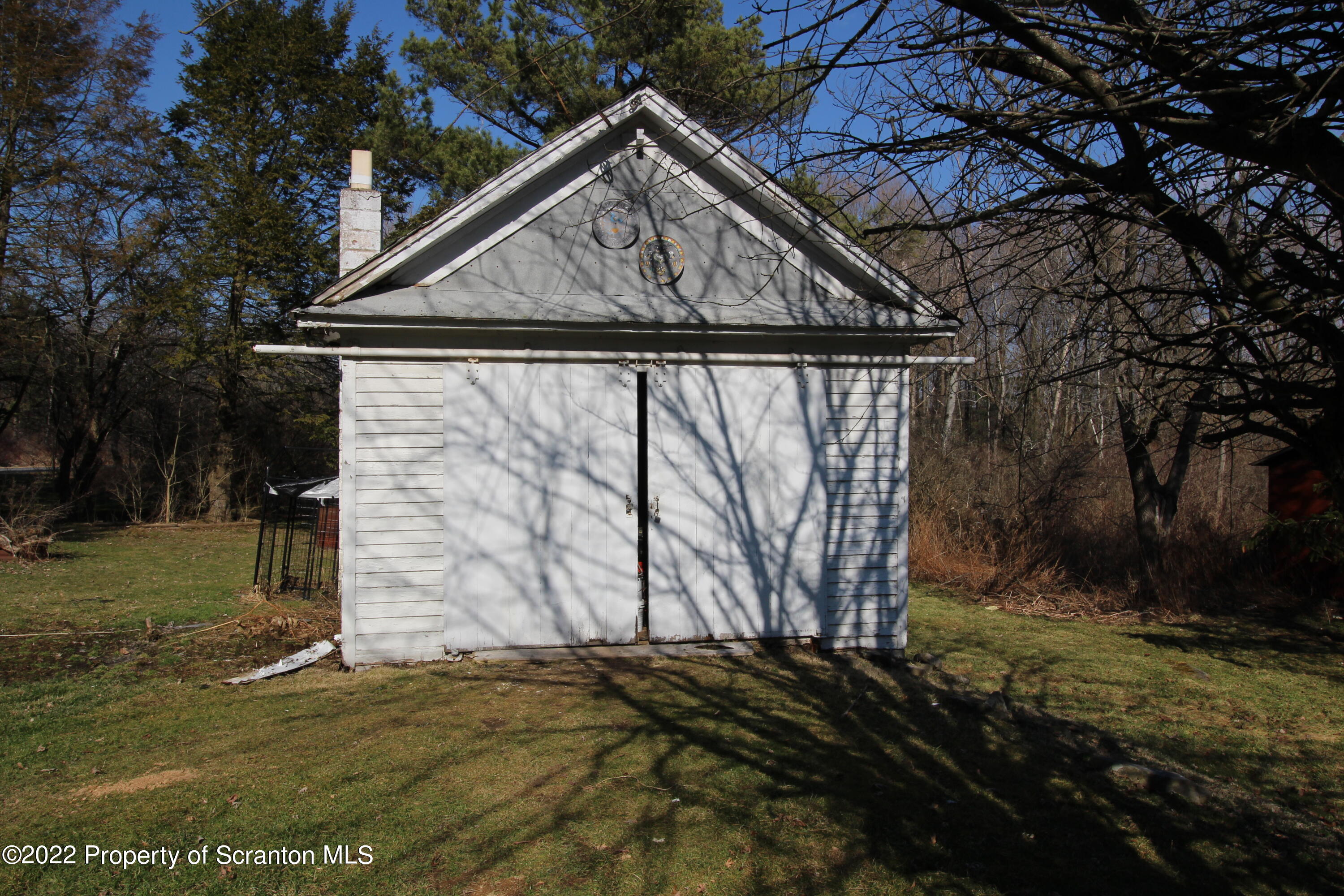 4001 Quicktown Road Moscow, PA 18444 - Photo 20 of 24 a backyard of a house with lots of green space