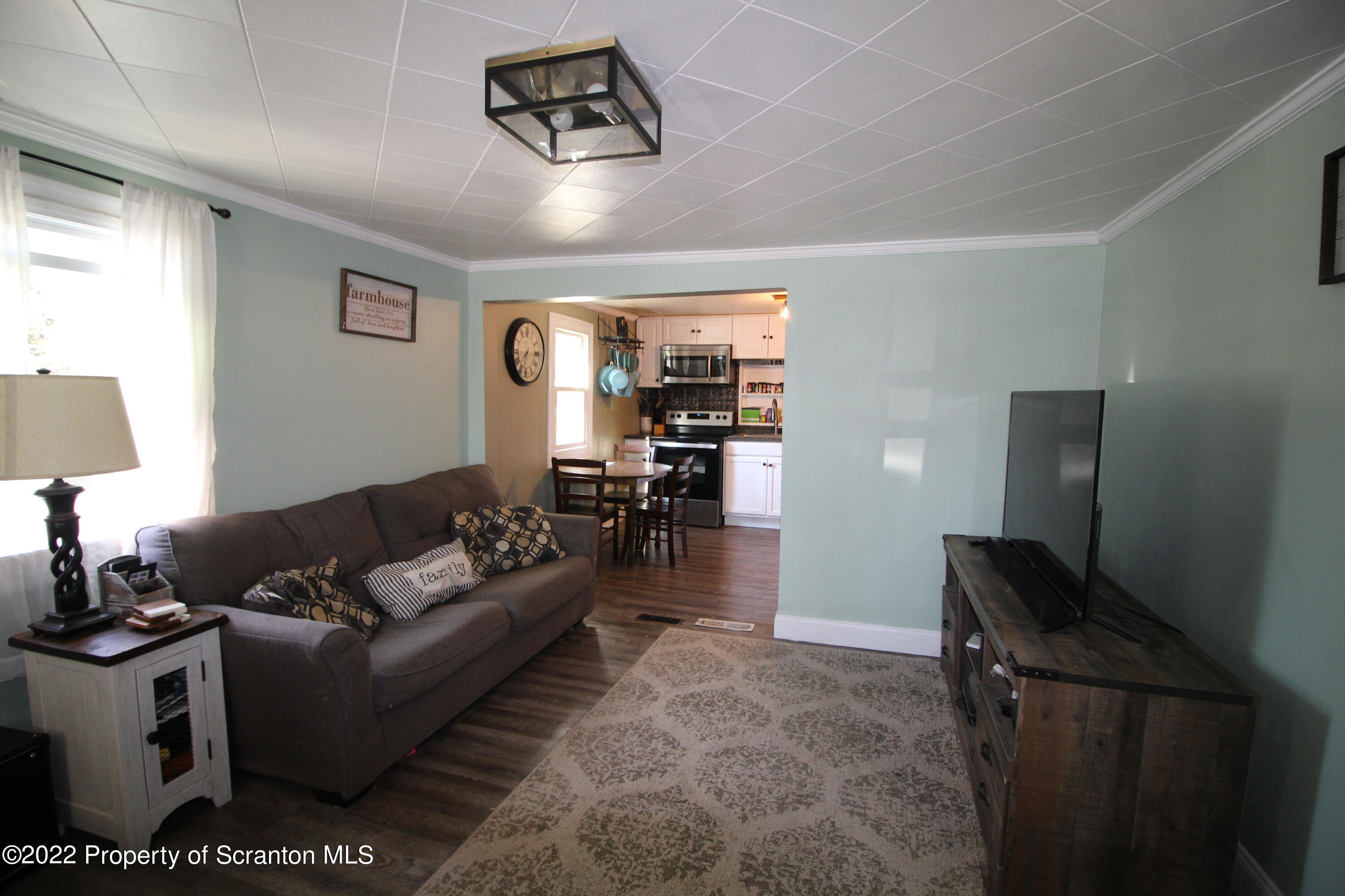 4001 Quicktown Road Moscow, PA 18444 - Photo 7 of 24 a living room with furniture and a flat screen tv