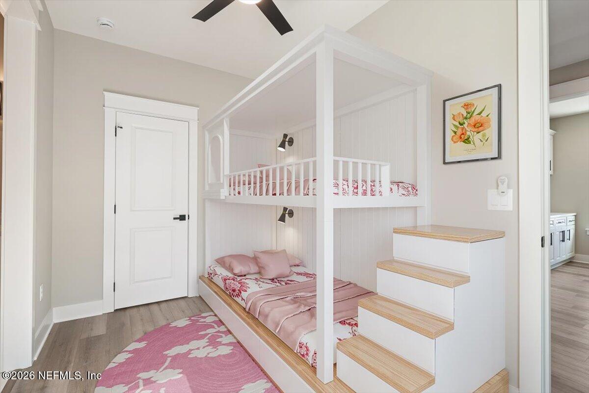 34883 Steeple Chase Way Callahan, FL 32011 - Photo 30 of 88 a bedroom with furniture and a window