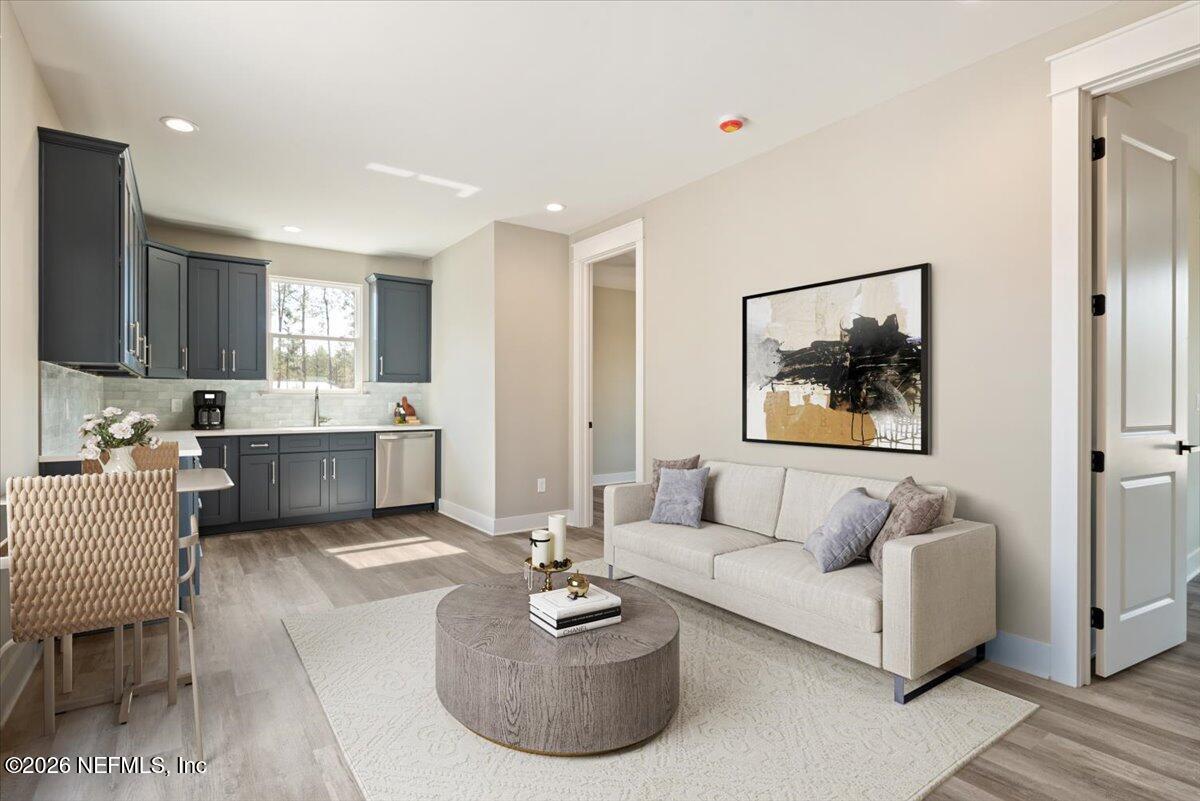 34883 Steeple Chase Way Callahan, FL 32011 - Photo 46 of 88 a living room with furniture and a couch