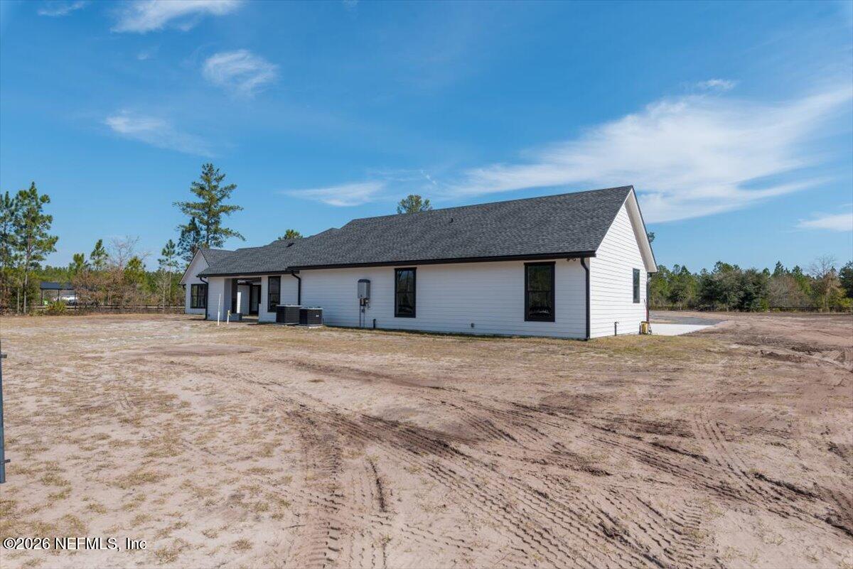 34883 Steeple Chase Way Callahan, FL 32011 - Photo 69 of 88 a front view of house with yard