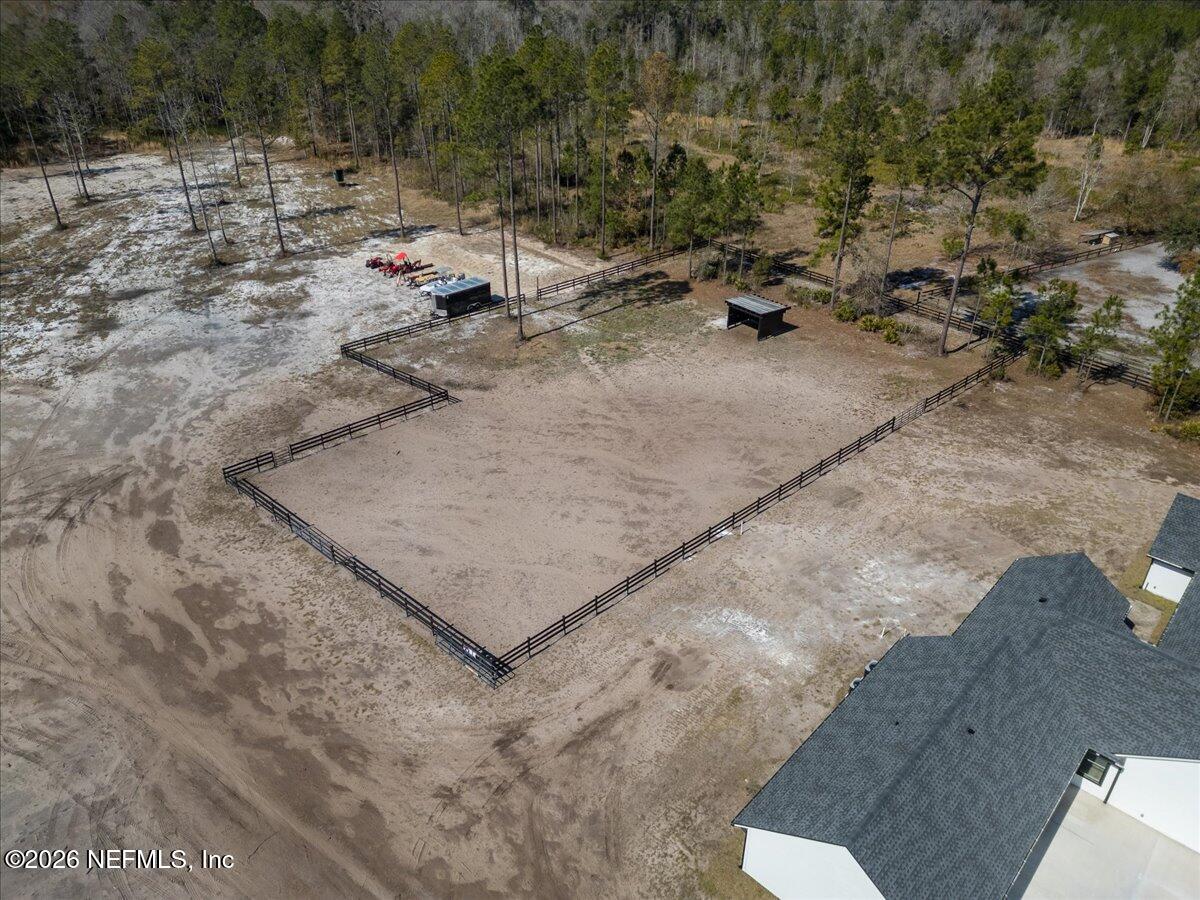 34883 Steeple Chase Way Callahan, FL 32011 - Photo 80 of 88 a view of a dry yard with wooden fence