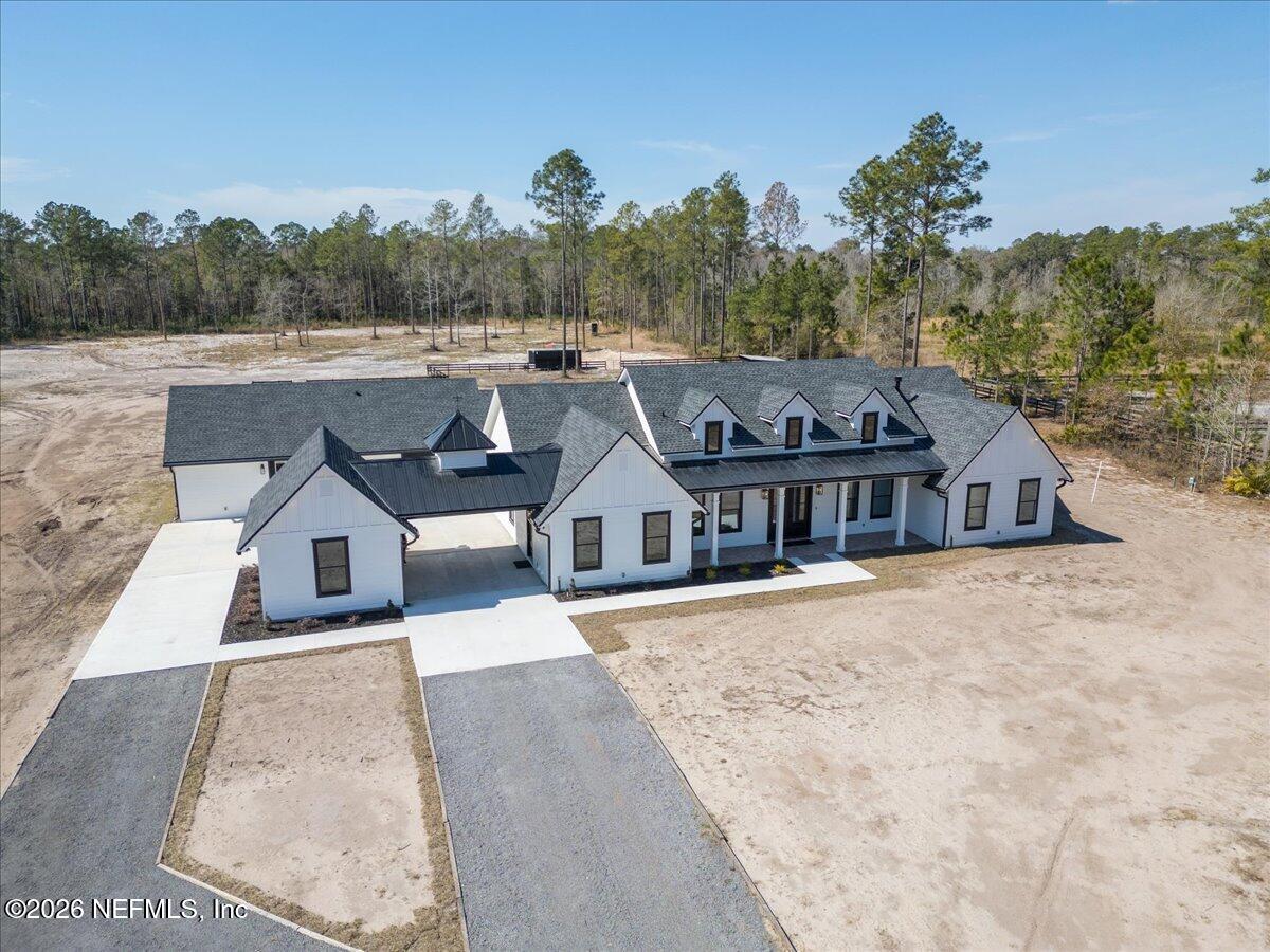 34883 Steeple Chase Way Callahan, FL 32011 - Photo 84 of 88 front view of a house with a yard