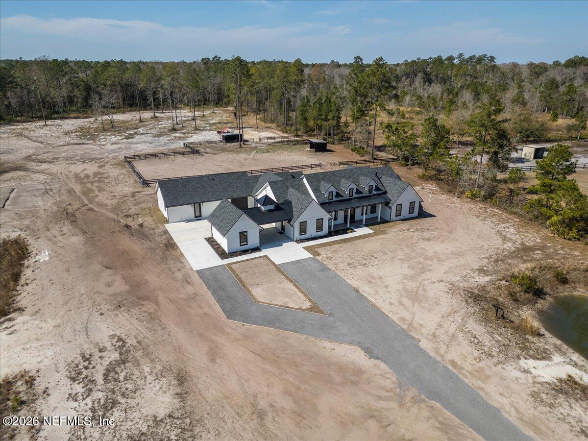 34883 Steeple Chase Way Callahan, FL 32011 - Photo 85 of 88 a view of a terrace with a forest
