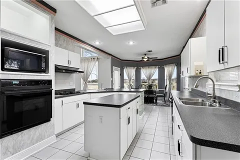 $490,000 | 1320 Lake Louise Drive, Gretna, LA 70056