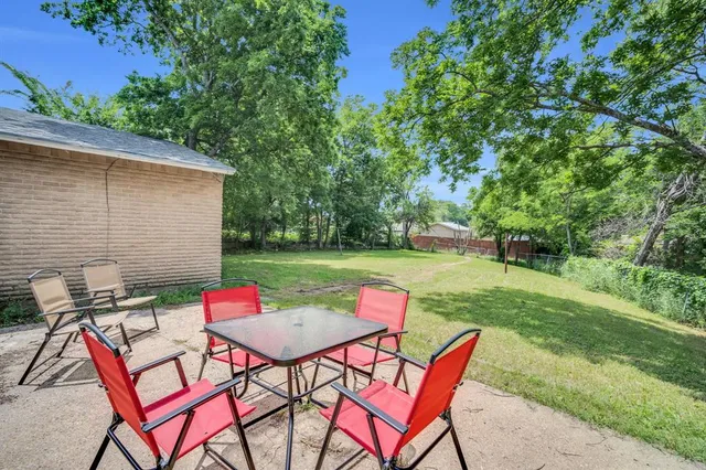 an outdoor space with furniture