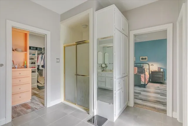 a view of a bedroom from a hallway