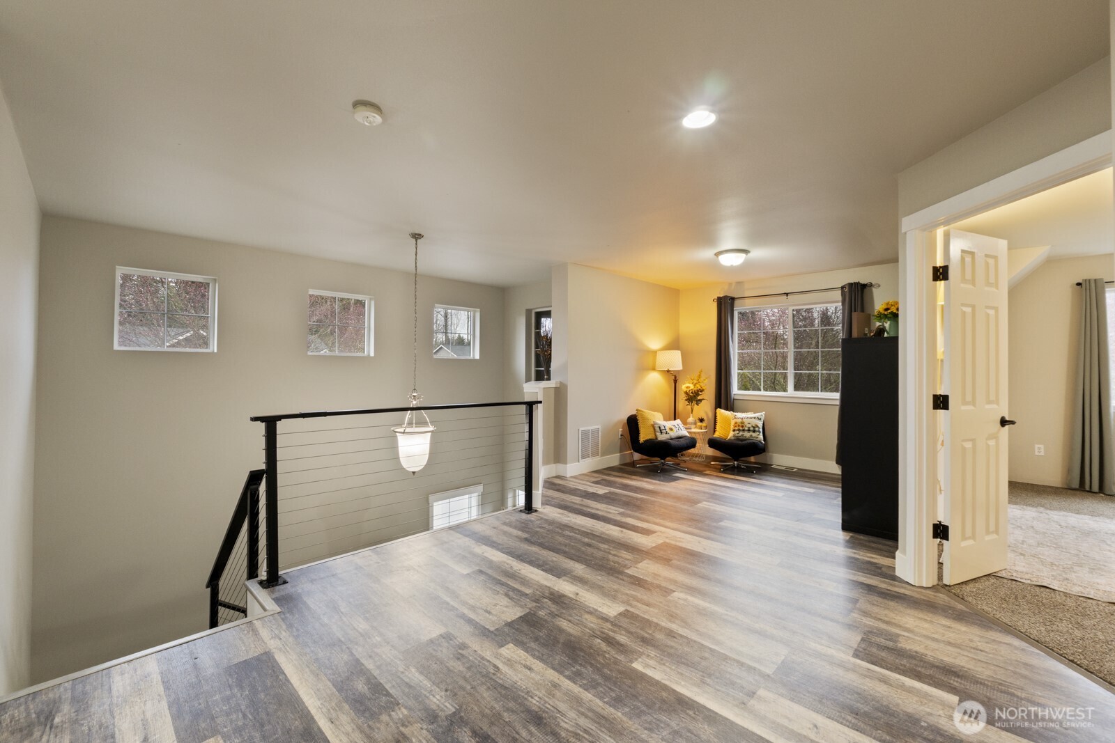 4233 154th Place Southeast Bothell, WA 98012 - Photo 19 of 40 a view of a room with gym equipment and floor to ceiling window