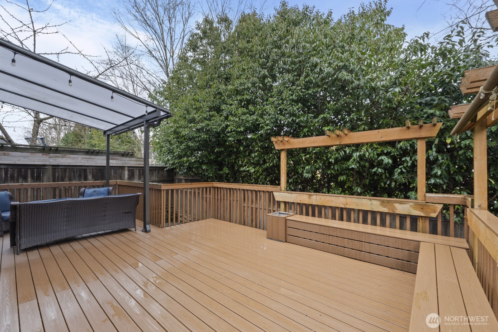 4233 154th Place Southeast Bothell, WA 98012 - Photo 38 of 40 a view of balcony with wooden floor and outdoor seating