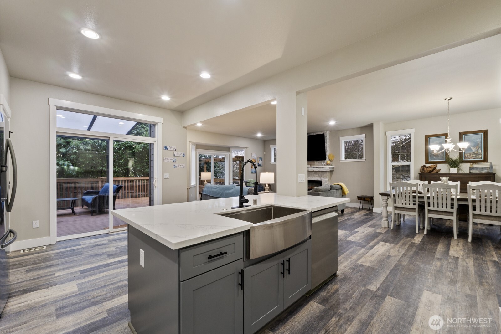 4233 154th Place Southeast Bothell, WA 98012 - Photo 5 of 40 a kitchen with sink stove and living room