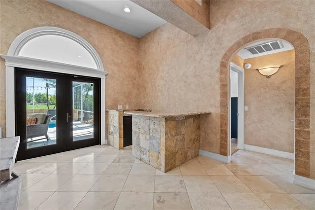 a view of an entryway with a door