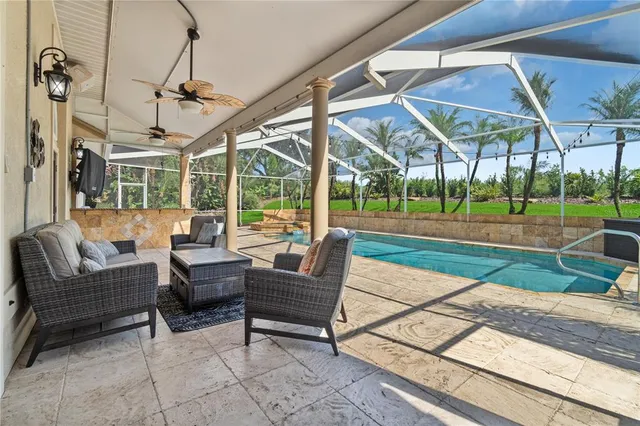 a backyard of a house with outdoor seating