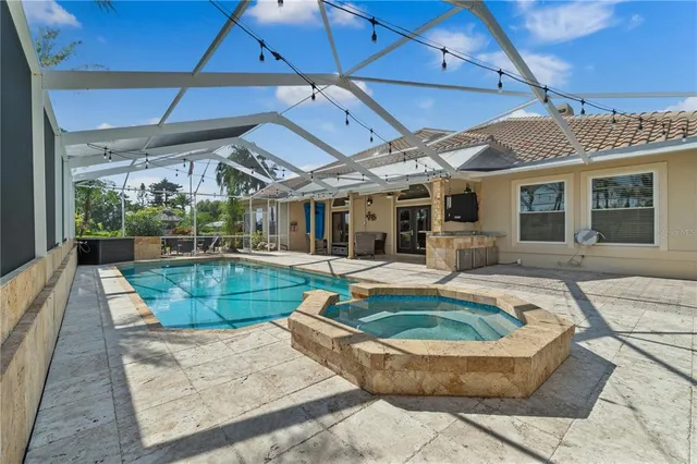 a view of a house with swimming pool