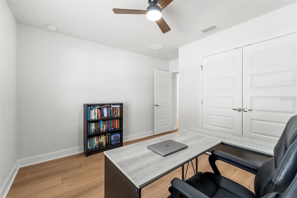 25093 Southwest 23rd Road Newberry, FL 32669 - Photo 19 of 29 a view of a workspace with furniture
